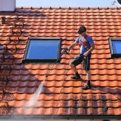 Reinigen van pannendak in Heythuysen